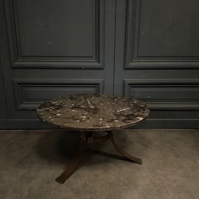 Coffee table with fossilized stone top and Brutalist legs 1970
