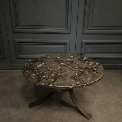 Coffee table with fossilized stone top and Brutalist legs 1970