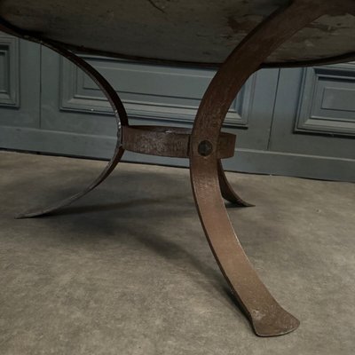 Coffee table with fossilized stone top and Brutalist legs 1970
