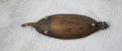 Patinated bronze 'Lily of the valley leaf' pocket tidy circa 1900