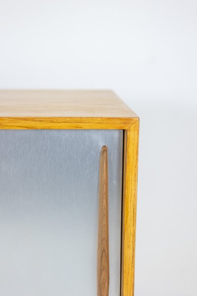 Ash low sideboard with sliding doors. 1960s. LS61591108C
