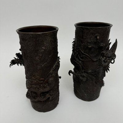 Pair of bronze tubular vases decorated with dragons Japan Meiji period