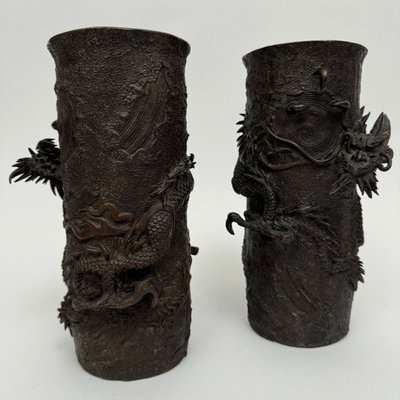 Pair of bronze tubular vases decorated with dragons Japan Meiji period