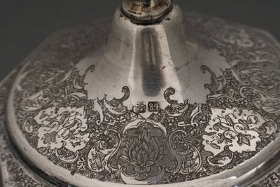 Pair of 19th century Persian silver candlesticks, engraved with bird design, hallmarked 84