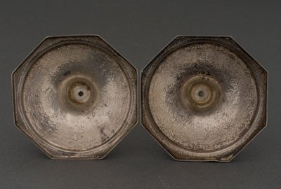 Pair of 19th century Persian silver candlesticks, engraved with bird design, hallmarked 84