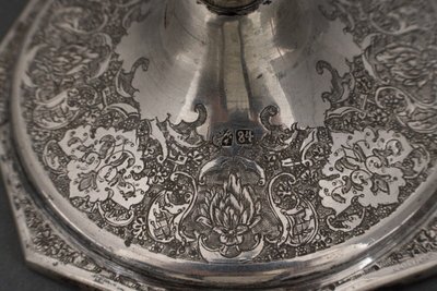 Pair of 19th century Persian silver candlesticks, engraved with bird design, hallmarked 84