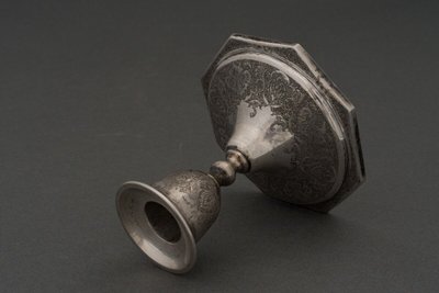 Pair of 19th century Persian silver candlesticks, engraved with bird design, hallmarked 84