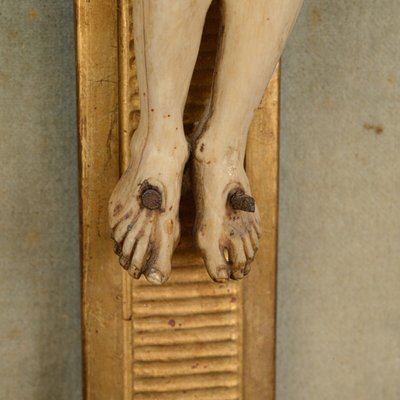 Hand-carved Christ 18th century gilded wood frame decorated with flowers