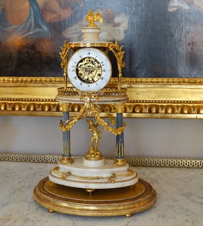 Louis XVI period clock with the temple of blind Love, guardian of Time - with its bell