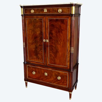 Louis XVI period command cabinet in flamed mahogany and gilt bronze, trefoil lock