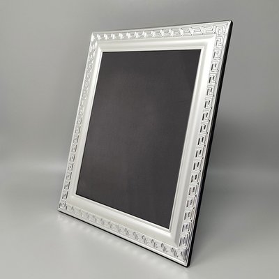 1970s Gorgeous photo frame in silver plated with glass. Made in Italy. The item is in excellent cond