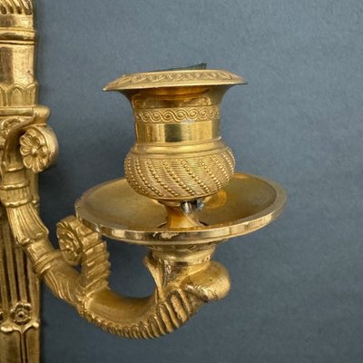 Paar Wandleuchten mit Palmetten aus vergoldeter Bronze 3 Leuchten Restauration XIX.