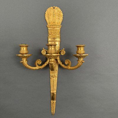 Paar Wandleuchten mit Palmetten aus vergoldeter Bronze 3 Leuchten Restauration XIX.
