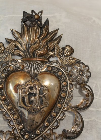 Ex-voto in fine embossed and filigree silver leaves, Italian work, early 20th century