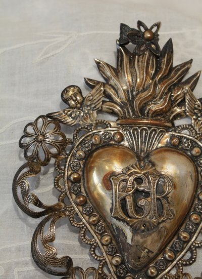 Ex-voto in fine embossed and filigree silver leaves, Italian work, early 20th century