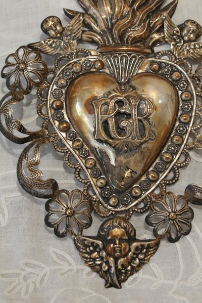 Ex-voto in fine embossed and filigree silver leaves, Italian work, early 20th century