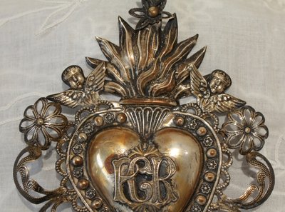 Ex-voto in fine embossed and filigree silver leaves, Italian work, early 20th century