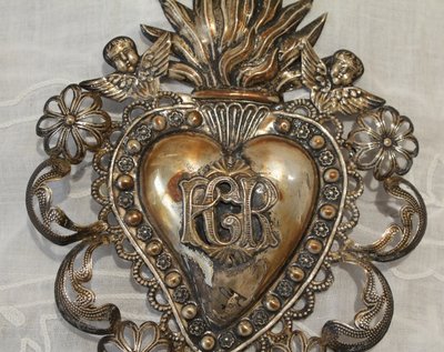 Ex-voto in fine embossed and filigree silver leaves, Italian work, early 20th century