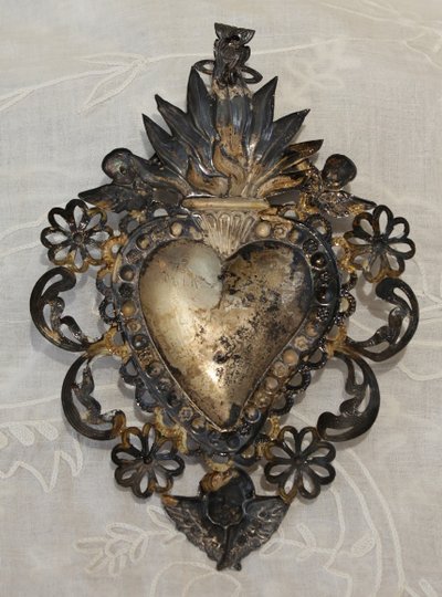 Ex-voto in fine embossed and filigree silver leaves, Italian work, early 20th century