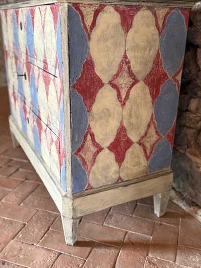 Napoleon III chest of drawers dating from the 19th century enhanced with pretty colored patterns and patina