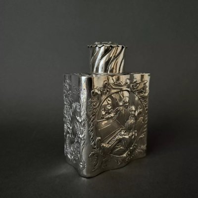 19th century silver tea box with romantic decor and Louis XV musicians