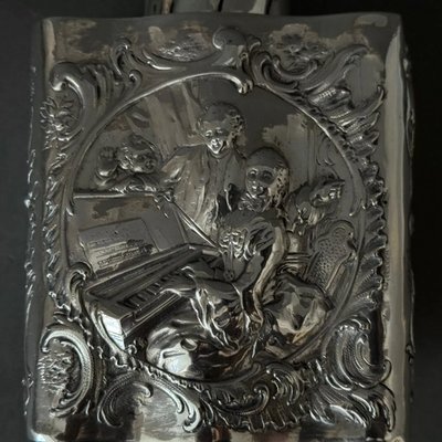 19th century silver tea box with romantic decor and Louis XV musicians