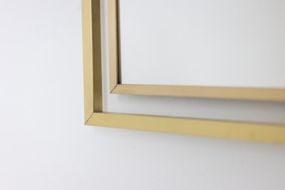 Miroir modèle « Boizot » en laiton, finition vernis. Contemporain. LS5943891Z