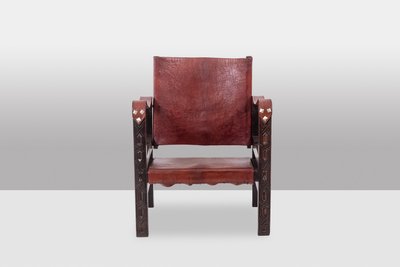 Poltrona “Safari” in legno e pelle cognac. Anni '60/'70. Codice articolo: LS6311309M