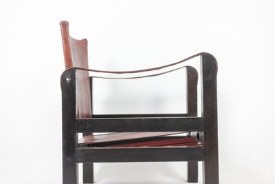 Poltrona “Safari” in legno e pelle cognac. Anni '60/'70. Codice articolo: LS6311309M