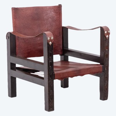 Poltrona “Safari” in legno e pelle cognac. Anni '60/'70. Codice articolo: LS6311309M
