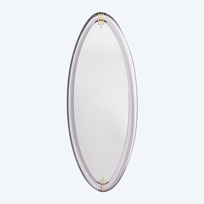 Lacquered and patinated brass mirror, ovoid shape. 1950s/60s. LS6351736M