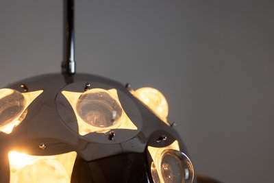 Oscar Torlasco.  Lampadario “Satellite” in metallo cromato. Anni '70. Codice articolo: LS6354918G