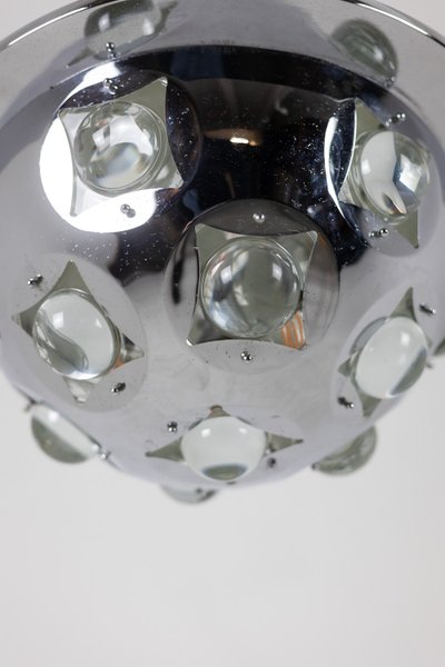 Oscar Torlasco.  Lampadario “Satellite” in metallo cromato. Anni '70. Codice articolo: LS6354918G