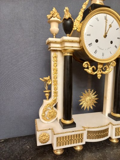 18th century gilt bronze and marble clock