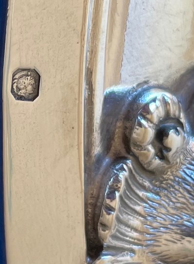 Semi-hollow solid silver dish.