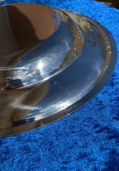 Semi-hollow solid silver dish.
