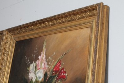 Ancienne paire de tableaux Vase aux fleurs huile sur toile. fin du 19e siècle. Cadres dorés contemporains signés Bélaval.
