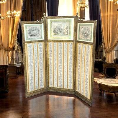 ANTIQUE SCREEN WITH 3 LEAVES IN CARVED AND GILDED WOOD WITH 19TH CENTURY ENGRAVINGS