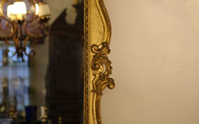 Miroir en bois et stuc doré à la feuille  Style Louis XV