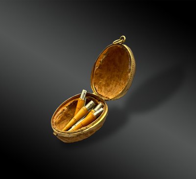 WALNUT SHELL and its 7 miniature NONTRON KNIVES - France - 20th century