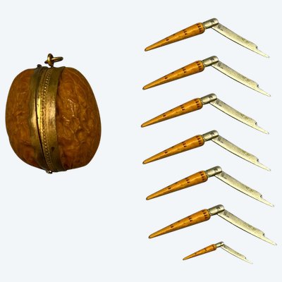 WALNUT SHELL and its 7 miniature NONTRON KNIVES - France - 20th century