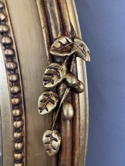 Specchio ovale in legno dorato Napoleone III