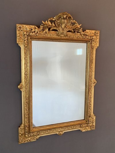 Specchio in legno intagliato e dorato in stile Luigi XVI, XIX secolo