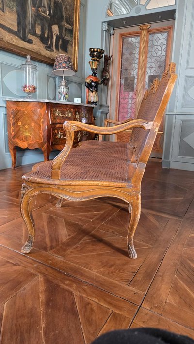 Louis XV period sofa with cane base, Lyonnais work attributed to Pierre Nogaret.