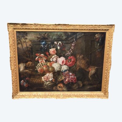 Natura morta con fiori, frutta, scimmia, pappagallo e cane. XVII secolo.