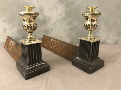Beautiful pair of antique cast iron and brass andirons from the early 19th century
