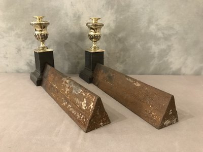 Beautiful pair of antique cast iron and brass andirons from the early 19th century