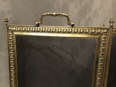 19th century pressed brass fireplace screen