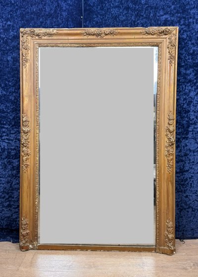 Empire period mirror in wood and gilded stucco circa 1810-1820