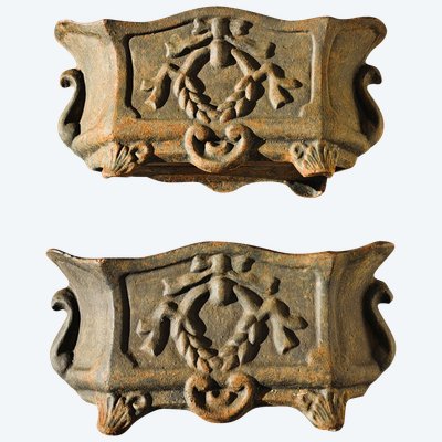 Pair of small cast-iron planters in the Louis XVI style